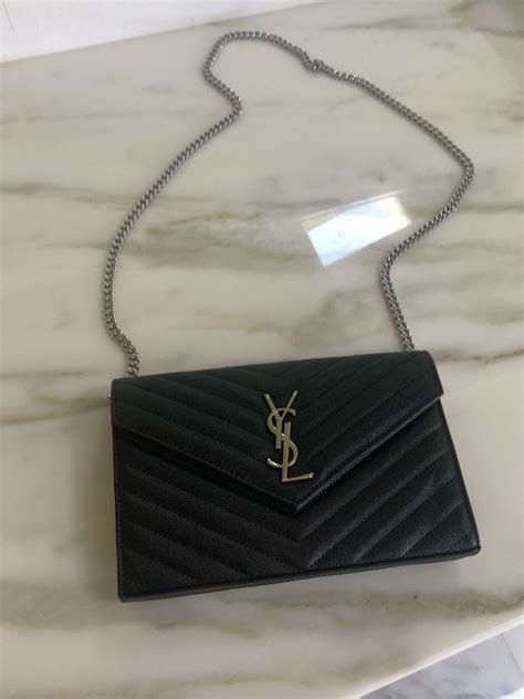 black ysl quilted bag|YSL black purse silver chain.